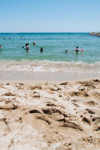 Scenic view of sea against clear blue sky