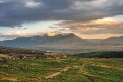 Scenic view of landscape against sky during sunset