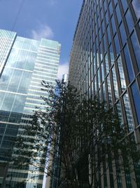 Low angle view of skyscrapers against sky