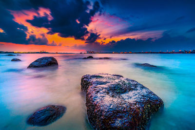 Scenic view of sea against sky during sunset