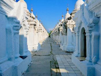 Panoramic view of white building against blue sky