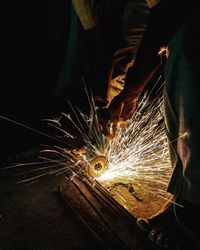 Low angle view of man working at factory