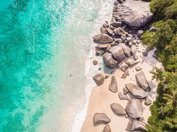 High angle view of rocks on beach, la digue seychelles 