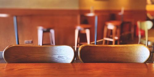 Chairs with table in restaurant