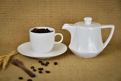 Close-up of coffee cup on table