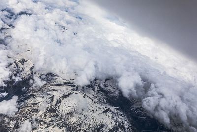 Aerial view of volcanic landscape against sky