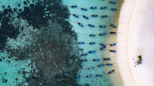 High angle view of nautical vessels moored on sea