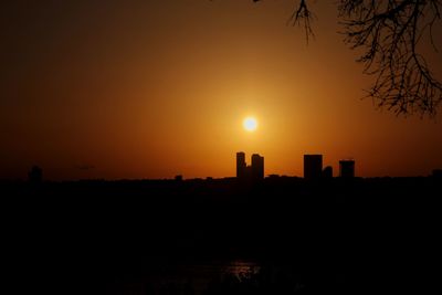 Scenic view of silhouette landscape against romantic sky at sunset