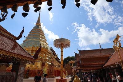 Group of people in temple against building