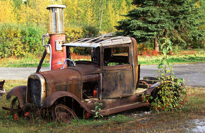 Abandoned truck on field