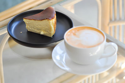 Close-up of coffee cup on table