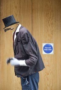 Clothing against wooden wall