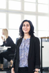 Young businesswoman in office