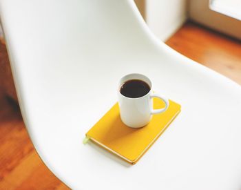 Close-up of coffee cup on table