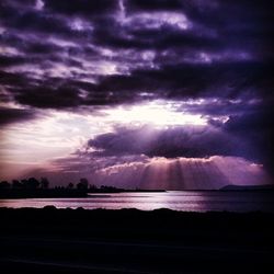 Scenic view of landscape against cloudy sky