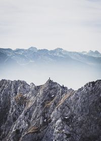 Scenic view of rocky mountains against sky