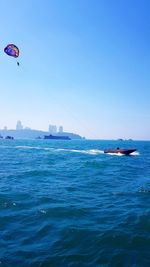 Scenic view of sea against blue sky