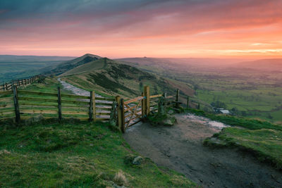 Scenic view of landscape against sky during sunset