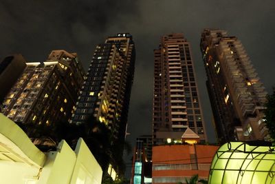 Low angle view of illuminated building at night