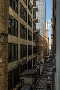 Buildings in city against sky