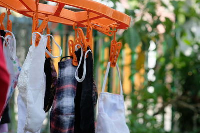 Close-up of clothes drying on clothesline