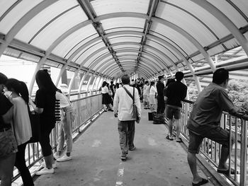 People walking in tunnel