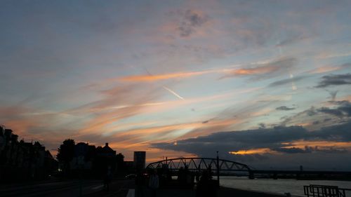 Silhouette of bridge at sunset