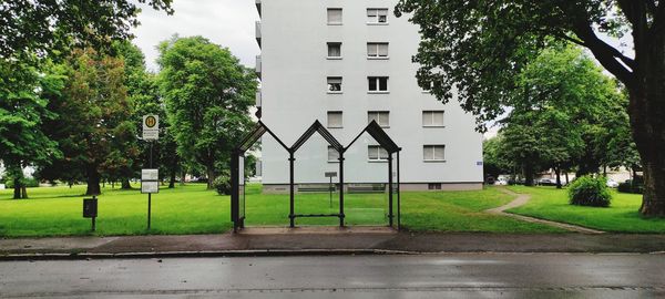 Park by building in city