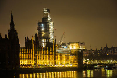 Illuminated buildings in city at night