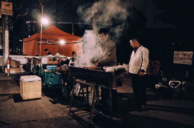 Men working at music concert