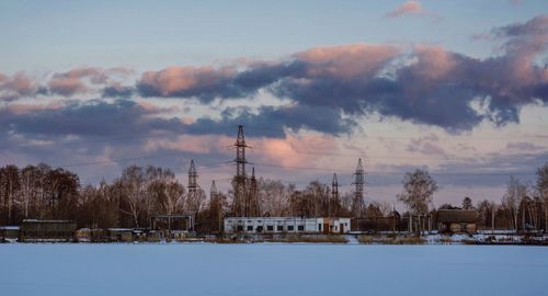 Built structure against sky at sunset