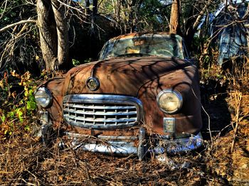 Close-up of abandoned car