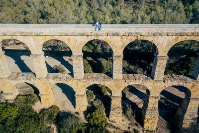 High angle view of les ferreres aqueduct against clear sky