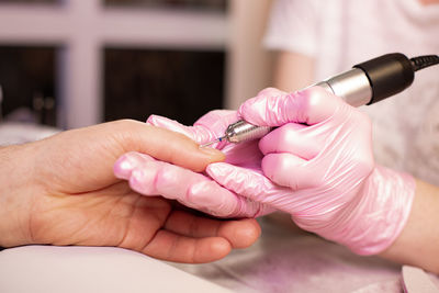 Close-up of woman getting pedicure