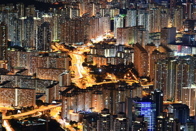 Aerial view of illuminated cityscape at night