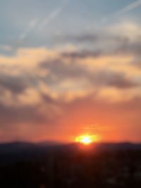 Scenic view of landscape at sunset