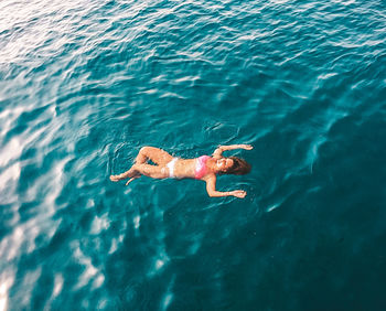 High angle view of person swimming in sea