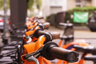 Close-up of bicycle on street in city