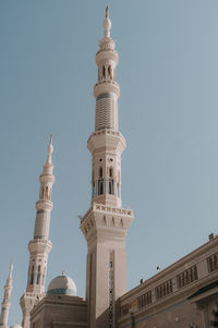 Low angle view of mosque against clear sky