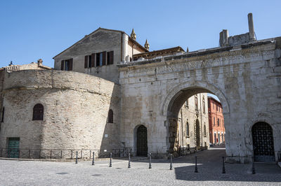 Low angle view of historic building against clear sky