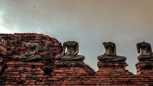 Low angle view of old temple against sky