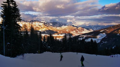 Scenic view of snowcapped mountains against sky during winter