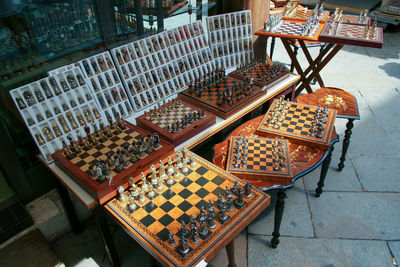 High angle view of chairs and tables at market stall