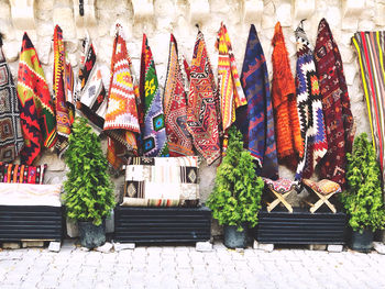Multi colored flags for sale in street market