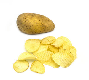 Close-up of bananas against white background