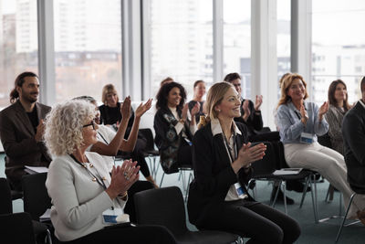 Business people sitting during business meeting