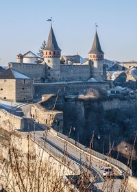 Panoramic view of the kamianets-podilskyi fortress on a sunny winter morning