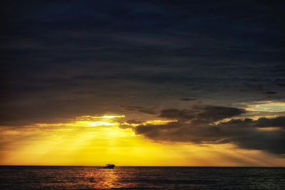 Scenic view of sea at sunset