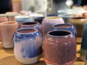 Close-up of containers on table for sale in store