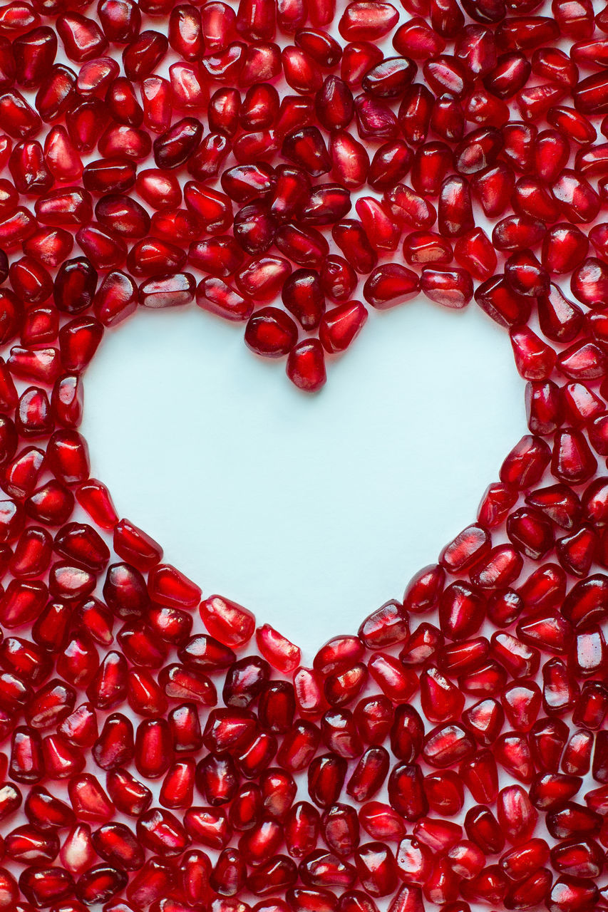 DIRECTLY ABOVE SHOT OF HEART SHAPE MADE FROM RED BERRIES